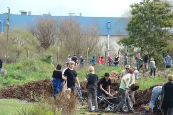 Sustainable Wairarapa volunteers planting at the old gas works.